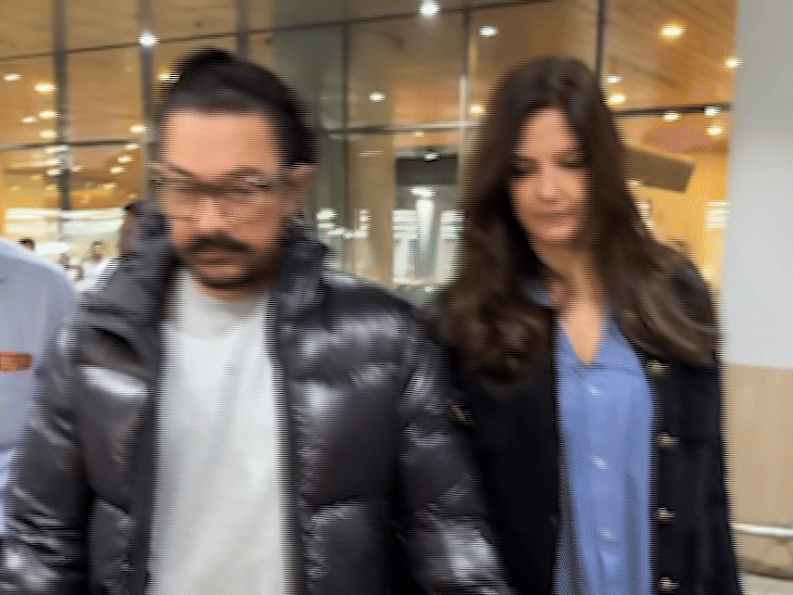 गर्लफ्रेंड गौरी स्प्रैट के साथ मुंबई लौटे आमिर खान:हाथ थामे हुए कंफी लुक में एयरपोर्ट से निकले; कृति सेनन, मीरा राजपूत, मौनी रॉय भी हुईं स्पॉट