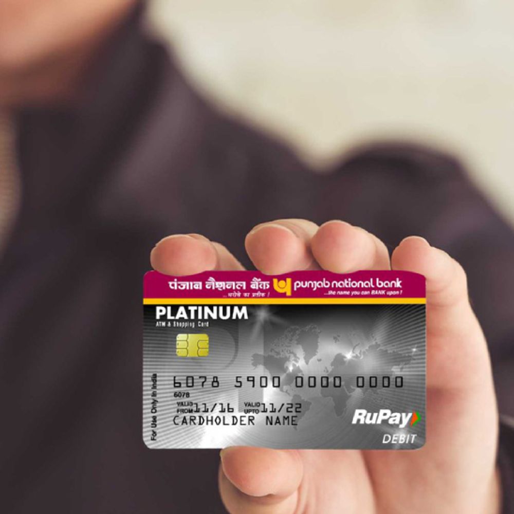 PNB ने ATM से कैश निकालने की लिमिट 50% घटाई:1 अप्रैल से लागू होंगे नए नियम; जानें किन कार्ड्स पर अब सिर्फ ₹50 हजार ही निकलेंगे