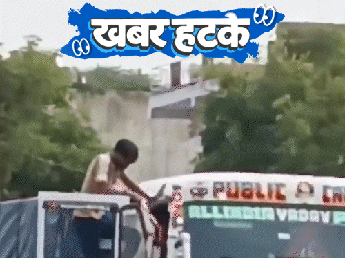 खबर हटके- बाढ़-तूफान में घूमने जा रहे चीन के लोग:चलते ट्रक के ऊपर ड्राइवर का डांस; मिट्टी से बन रही बिजली